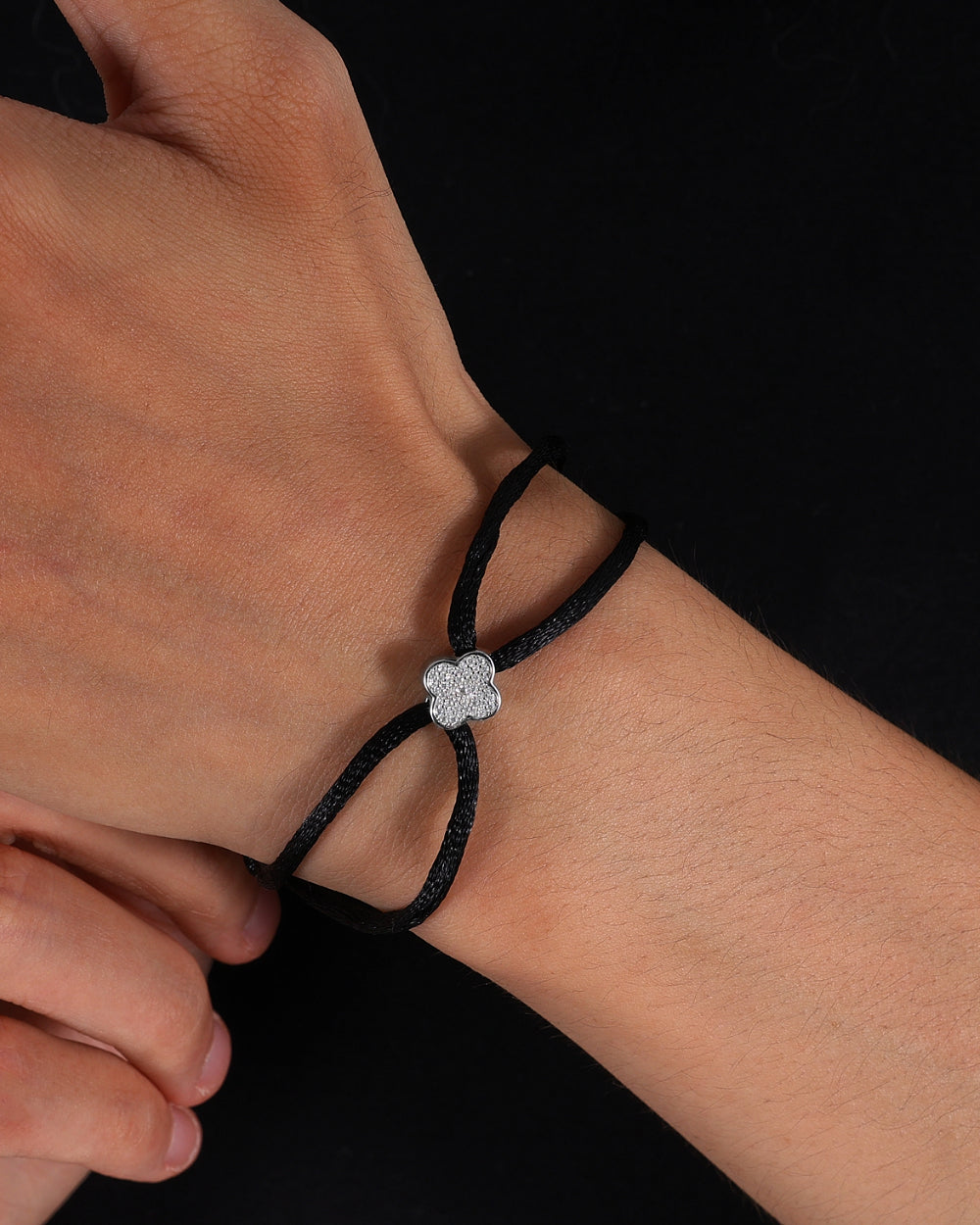 MOISSANITE ICED CLOVER CORD BRACELET.